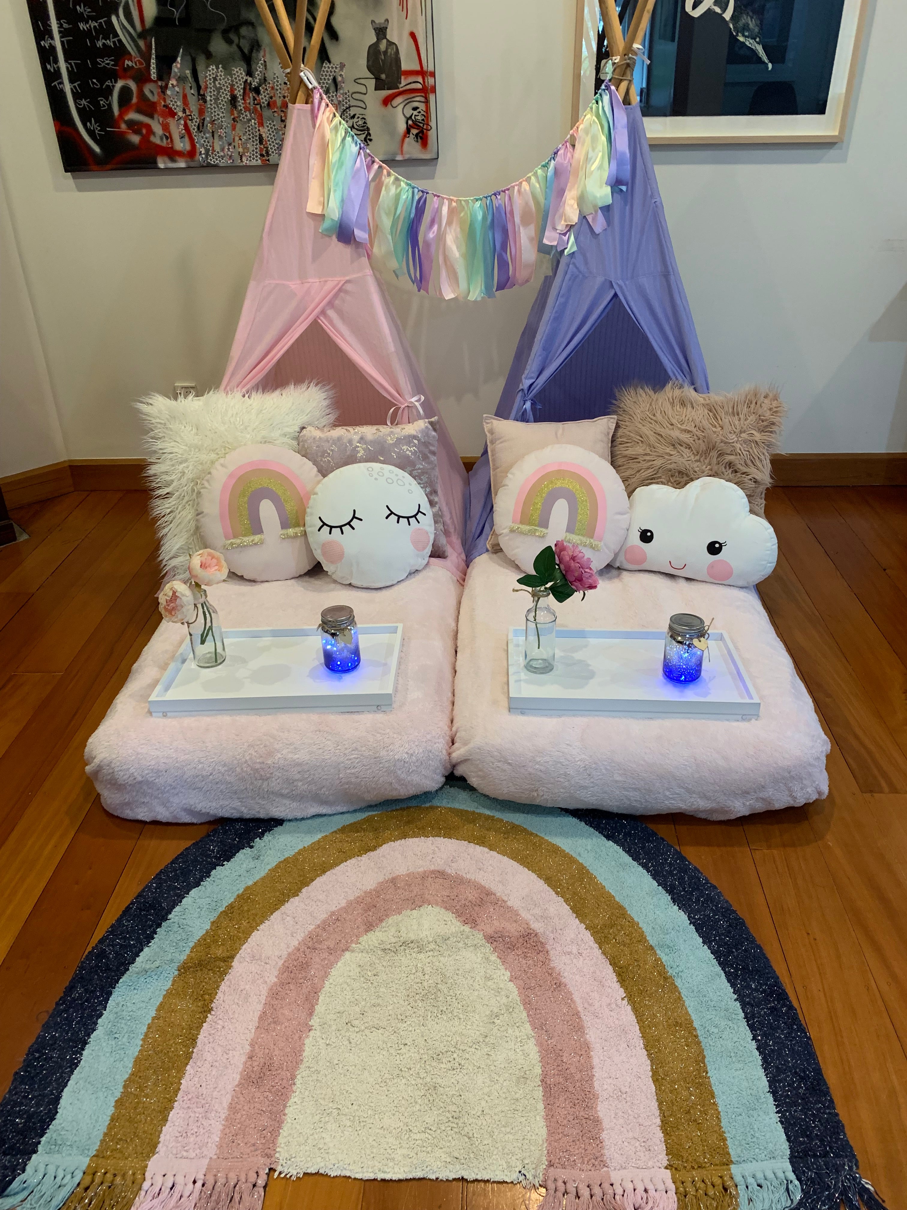 Pastel rainbow themed teepee slumber party hire Wellington