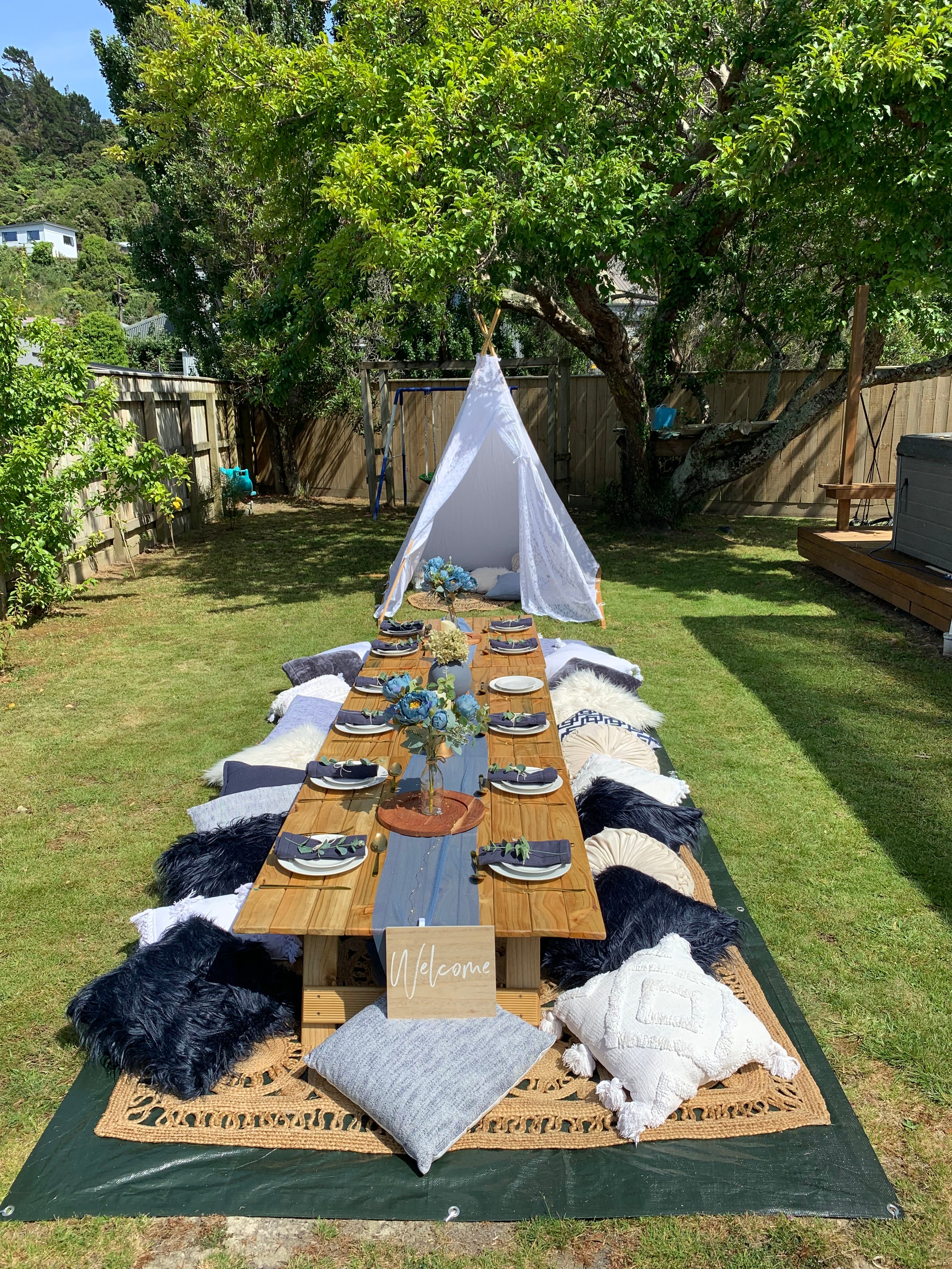 Blue boho luxury picnic setup Wellington